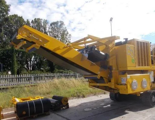 Yellow mobile crushing plant on a work site